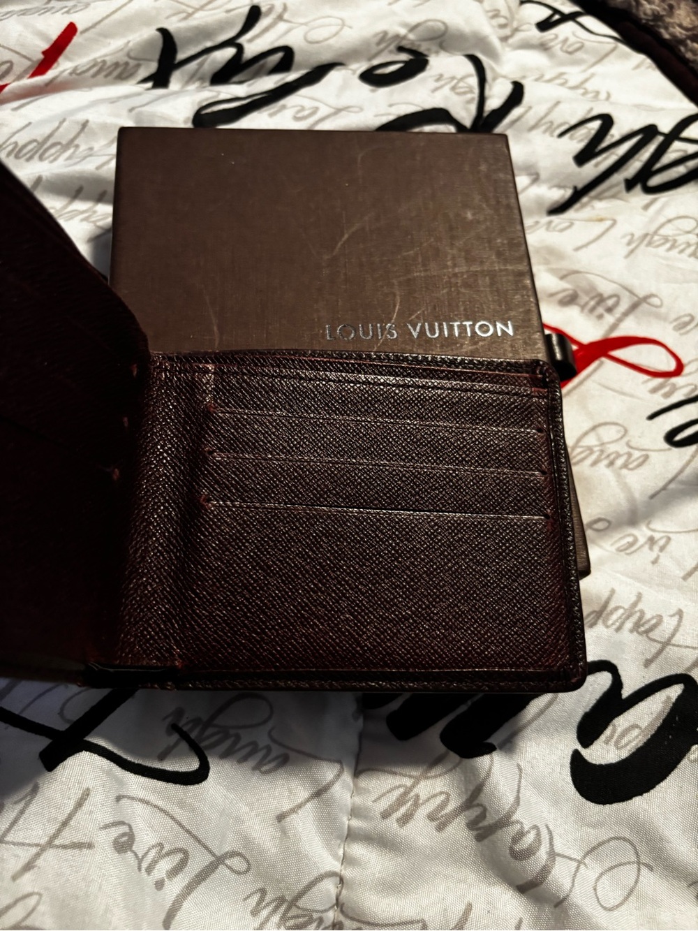 Louis Vuitton Dark Brown Textured Leather Bi-Fold Wallet - Picture 3 of 8
